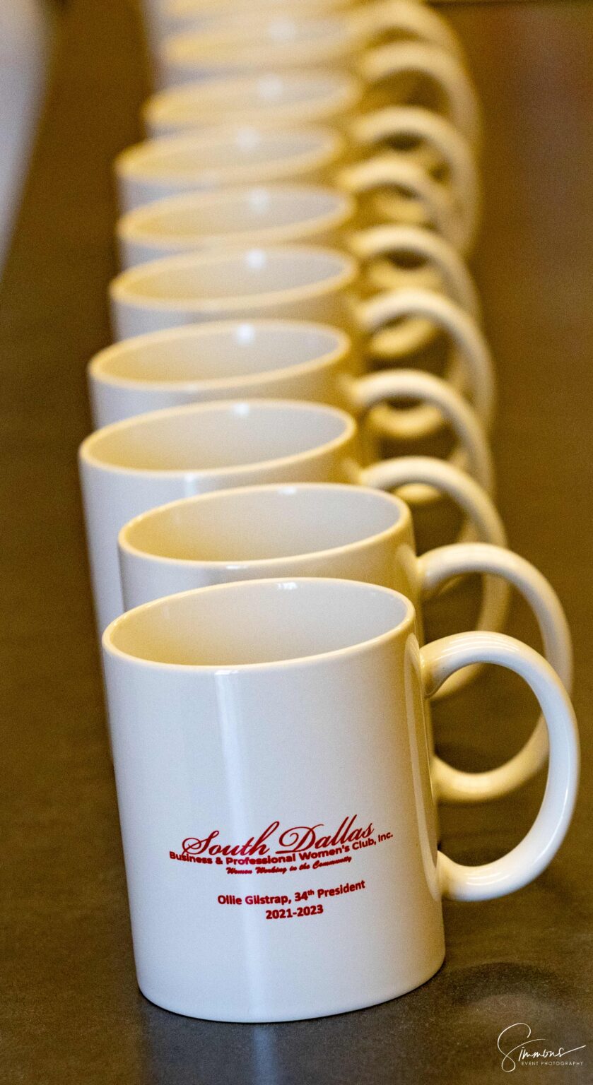 A row of coffee cups lined up on top of each other.
